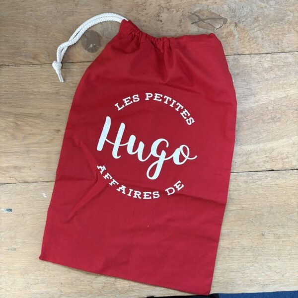 sac à linge rouge M Hugo